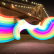 Illustration for article titled You can make man made rainbows with this giant LED glow stick